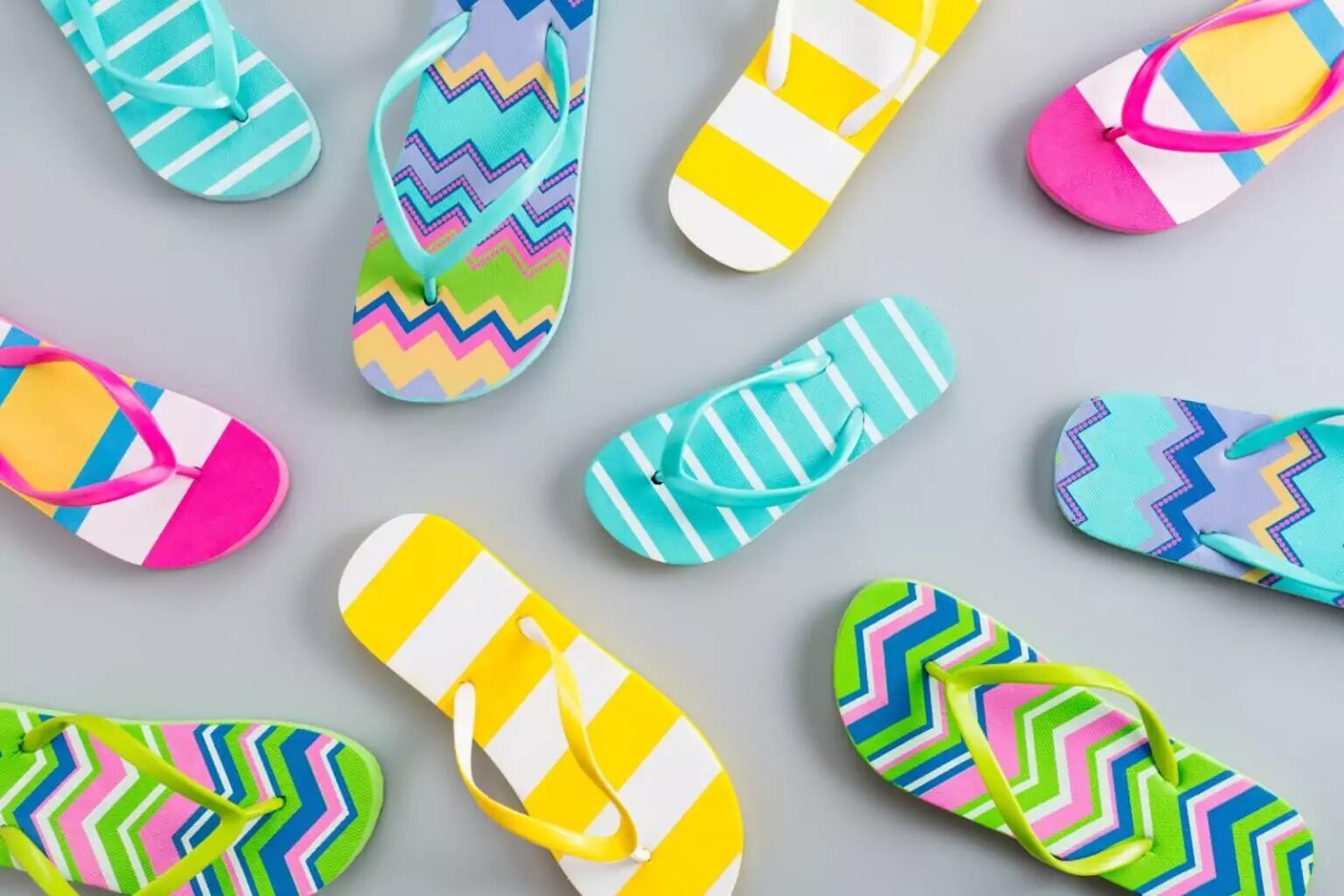 Colorful, striped flip-flops made of EVA foam